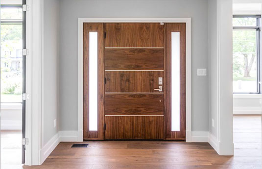 Wooden front door made by Escon Door