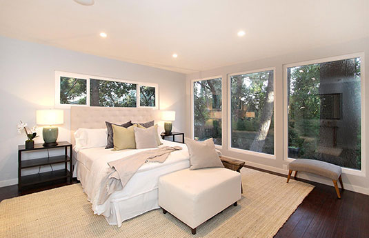 bedroom with large glass windows